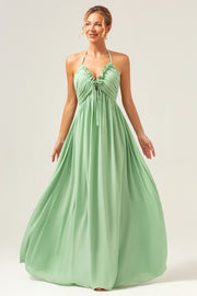 Light Green A Line Halter Backless Ruched Long Bridesmaid Dress with Lace Up Back